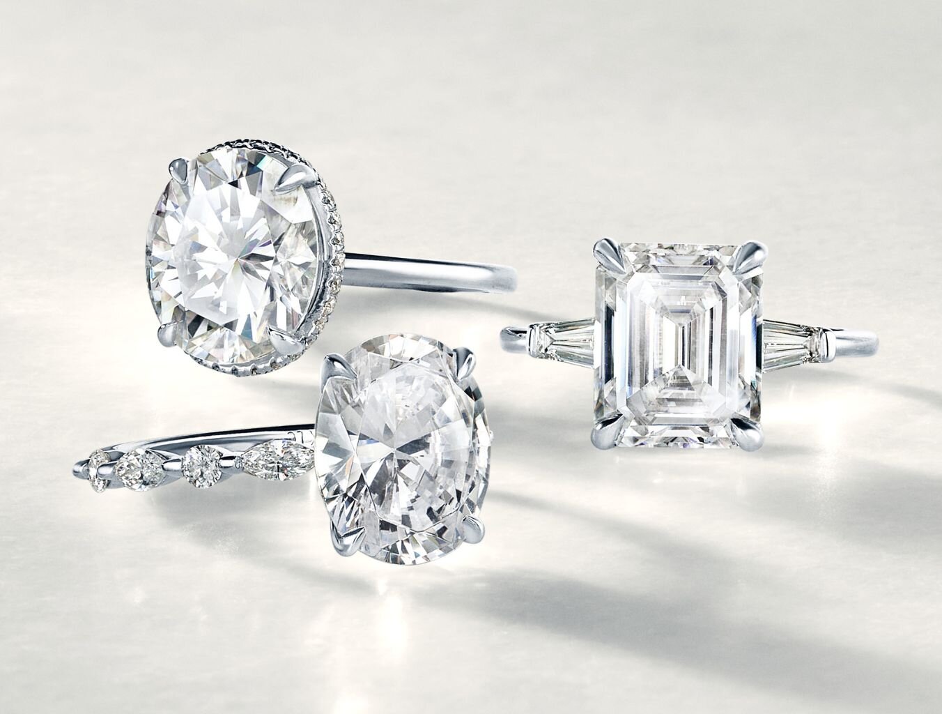 Moissanite engagement rings with different shaped center stones